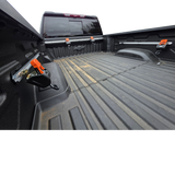 Truck bed tie down system