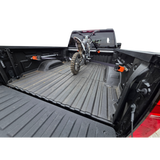 Truck bed tie down system
