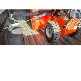 Truck bed tie down system
